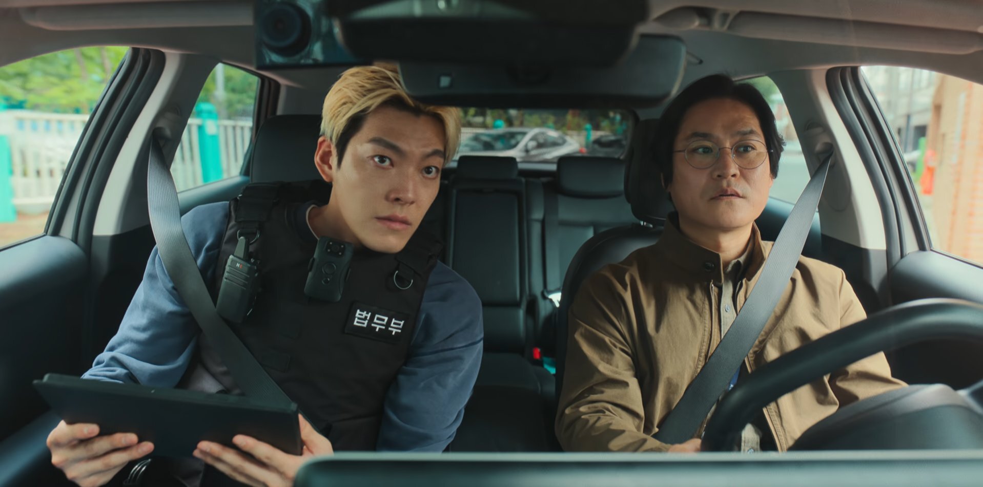 Kim Woo-bin (left) and Kim Seong-gyoon in a still from Officer Black Belt. (Photo: Netflix)